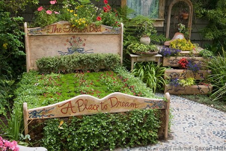 "A Place to Dream" - a bit of garden whimsy causes us to question our assumptions on just what a garden bed can be.
